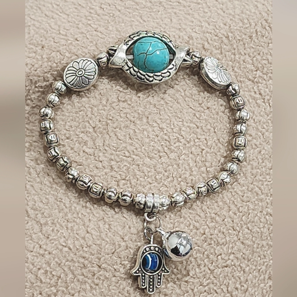 Turquoise silver plated bracelet with evileye on hand